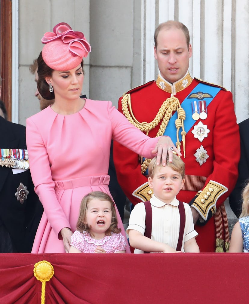 Kate Middleton fixes Prince George's hair at the Trooping the Colour.