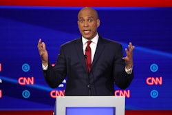 Cory Booker speaking at a podium on CNN