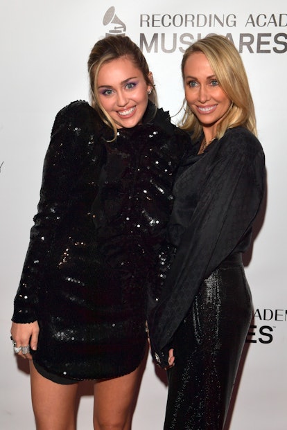 Noah and Tish Cyrus on the red carpet.