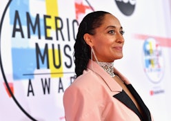 Tracee Ellis Ross in a pink and black suit at the american music awards red carpet