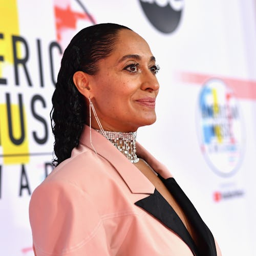 Tracee Ellis Ross in a pink and black suit at the american music awards red carpet