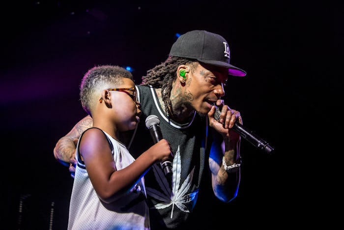In a recent interview with Kelly Clarkson rapper Wiz Khalifa, pictured here with son Sebastian, shar...