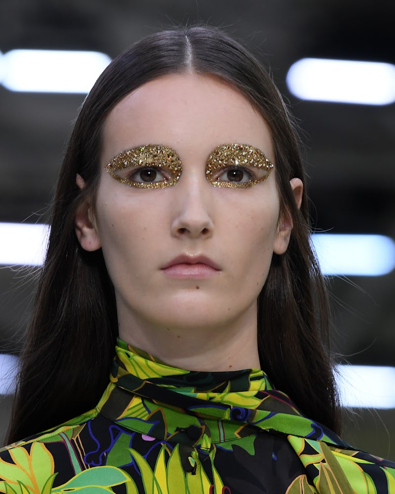 Model wearing Pat McGrath Lab's Obsessive Opulence collection on the runway at Valentino 