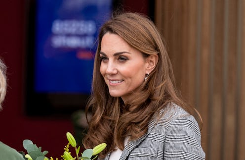 Kate Middleton's burgundy pants and plaid blazer are workwear staples. 