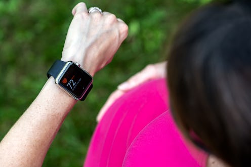 A woman with an Apple Watch monitors her heart rate. The Apple Research App will enable users to par...