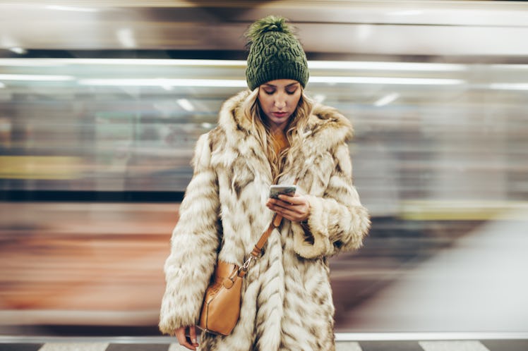 Young woman annoyed at train station on Thanksgiving