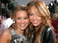Miley Cyrus and Emily Osment hit the red carpet together.