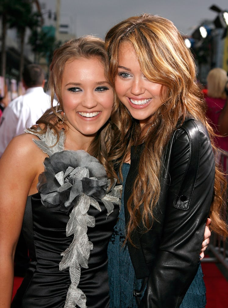 Miley Cyrus and Emily Osment hit the red carpet together.