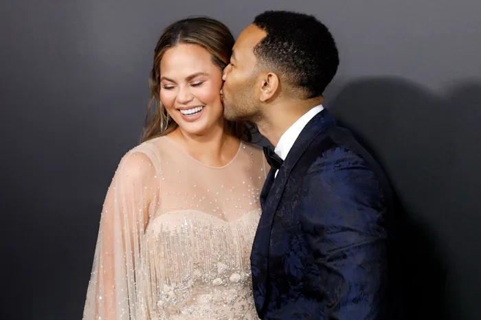 John Legend has said Chrissy Teigen's postpartum depression ultimately strengthened them as a couple...
