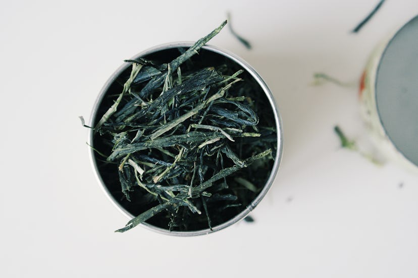 Sencha green tea leaves. Green and black tea have lower caffeine levels than coffee, and herbal tea ...