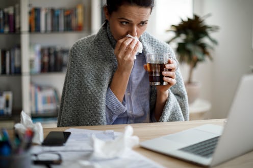 A woman fights the flu. Serious influenza infections can influence the menstrual cycle, but only in ...