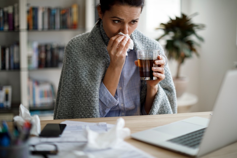 A woman fights the flu. Serious influenza infections can influence the menstrual cycle, but only in ...