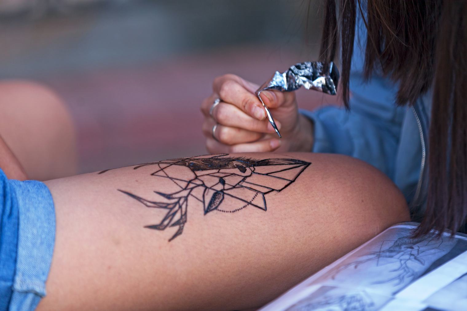 Do You Have To Shave Before Getting A Tattoo? Here's How The Experts