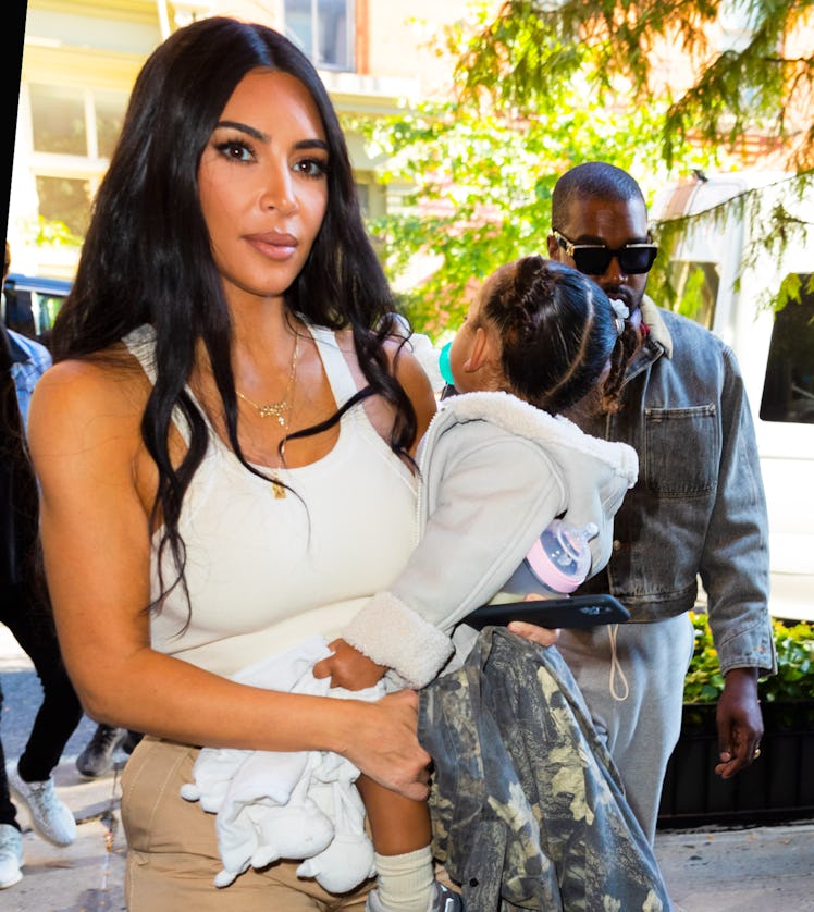 Kim Kardashian and Kanye West step out with their kids.