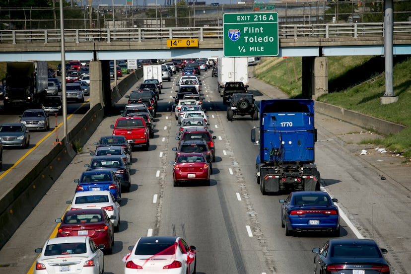 A Michigan highway with stalled cars. Transgender people in Michigan can now easily update their IDs...