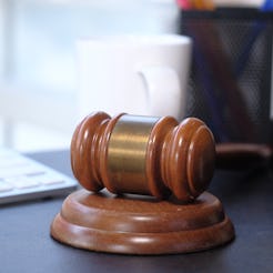 A judge's gavel on a desk. Jury duty can be traumatizing for jurors -- especially if they're survivo...