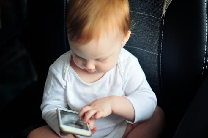 Your baby's love for your cell phone is partly because of how you interact with it, experts say.