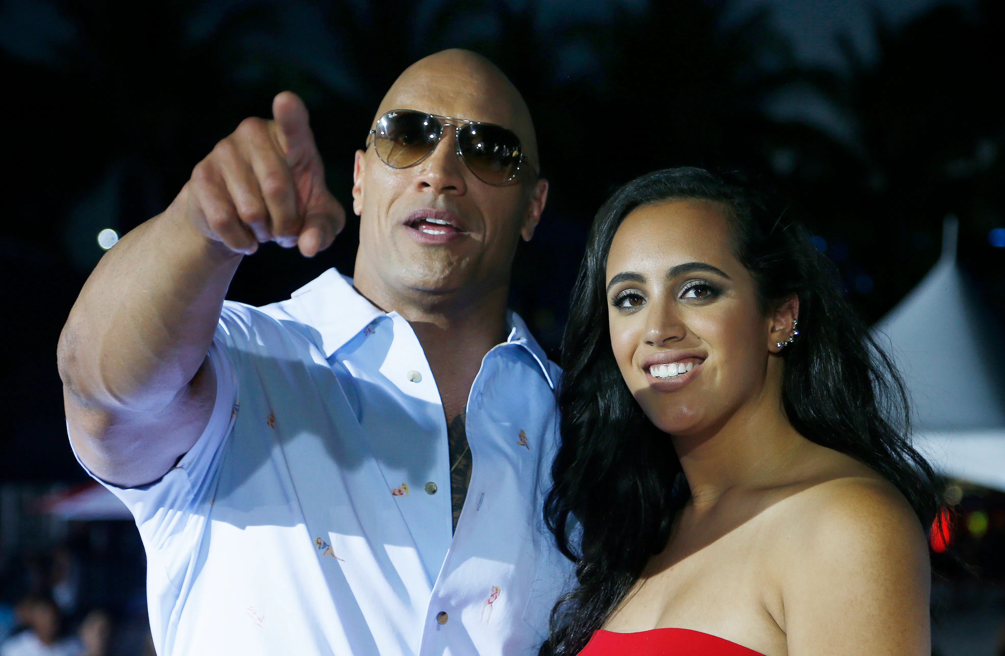 10 Photos Of Dwayne 'The Rock' Johnson With His Kids Being A Big Softie