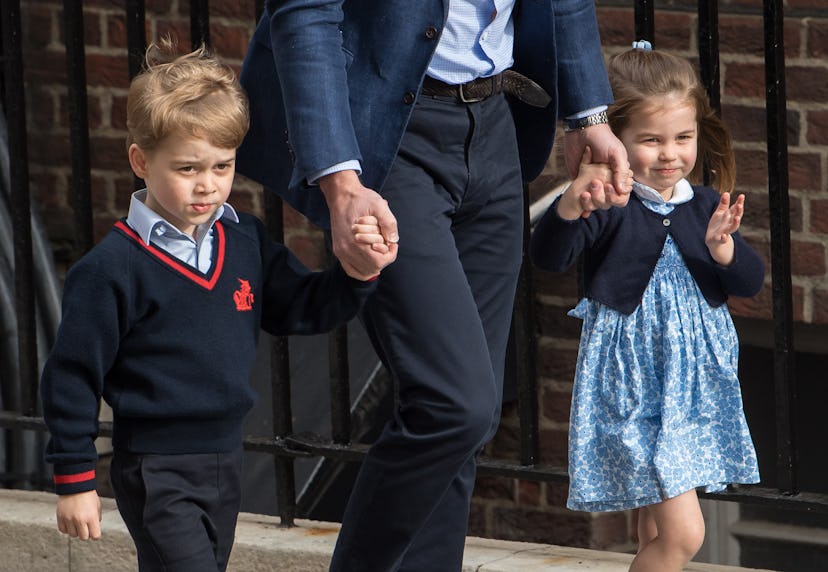 Princess Charlotte waves to her fans on the way to meet baby brother Prince Louis while Prince Georg...