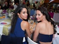 Meghan Markle and Jessica Mulroney pose for a photo.