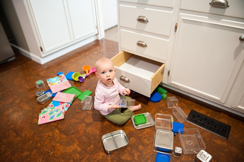 Babies love playing in drawers to develop a sense of awareness and explore their surroundings. 