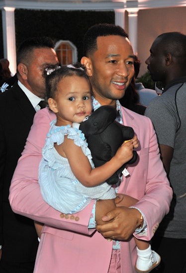 John Legend steps out with his daughter Luna.