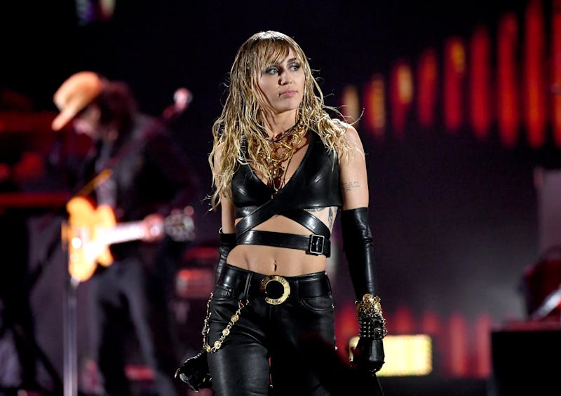 Miley Cyrus performed "Old Town Road" with boyfriend Cody Simpson and dad Billy Ray Cyrus at a Happy...