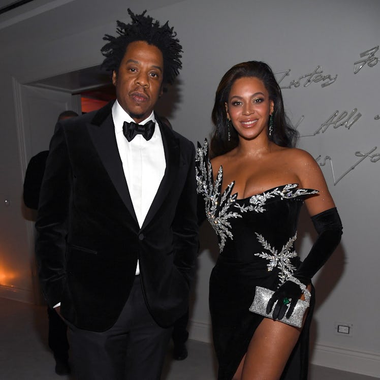 Jay-Z and Beyonce attend Diddy's 50th birthday party.