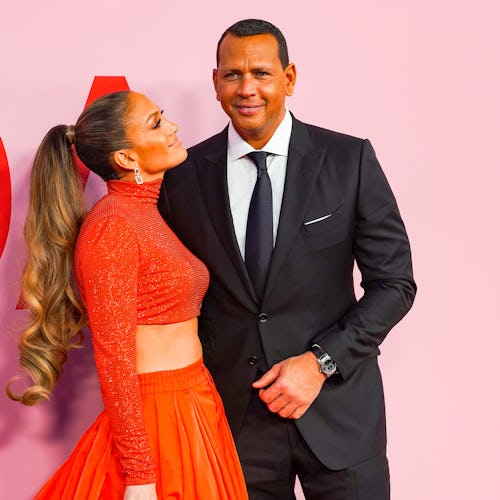 Jennifer Lopez and Alex Rodriguez posing together at a red carpet event