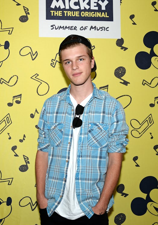 Alex Lange attends an event for Disney.