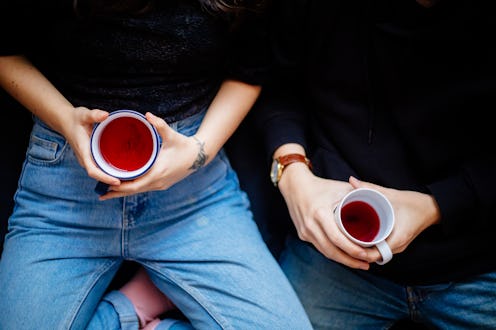 Two women hold herbal tea. Going sober for January is increasingly popular, and you may see small ch...