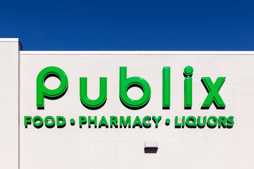 The entrance to a Publix store with the logo on top in green 