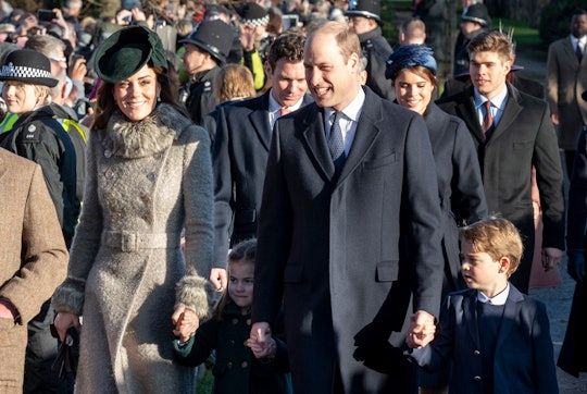 Kate Middleton, Princess Charlotte, Prince William, and Prince George walking and holding hands