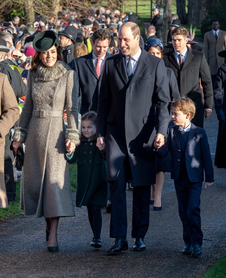 Prince George and Princess Charlotte held hands with their parents while walking towards the church.