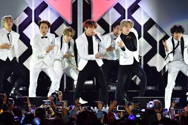 BTS Korean boy band performs on stage.