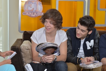 One Direction plays a game during a live interview.