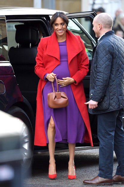Meghan Markle's red and purple color blocking was a major style moment. 