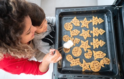 Baking with your kids is great for bonding and their fine motor skills.