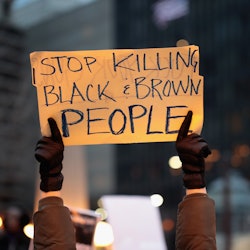 Stop killing black and brown people sign