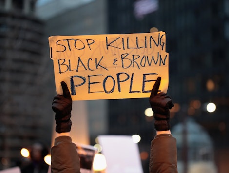 Stop killing black and brown people sign