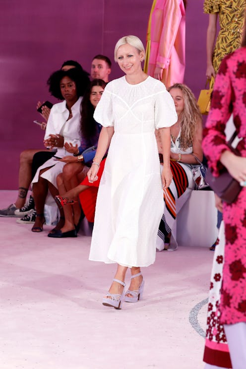 Nicola Glass, Kate Spade's Creative Director, in a white dress with short blonde hair