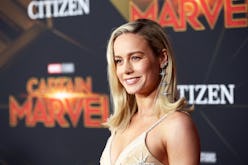 Brie Larson posing at a red carpet