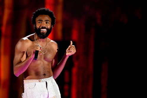 Donald Glover, also known by his stage name Childish Gambino, performing shirtless