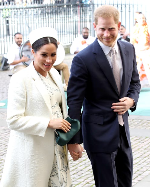 Meghan Markle & Prince Harry walking hand in hand