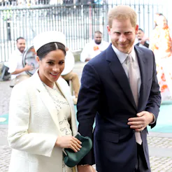 Meghan Markle & Prince Harry walking hand in hand
