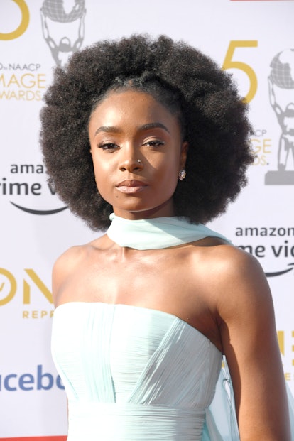 Kiki Layne opting for afro with front cornrows for her red carpet look 