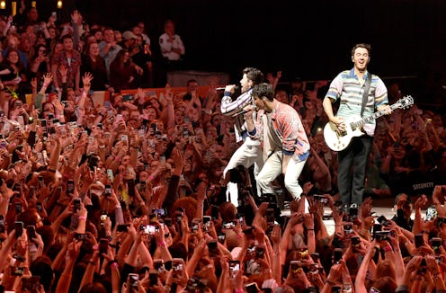 The Jonas Brothers' BBMAs Performance with a large crowd