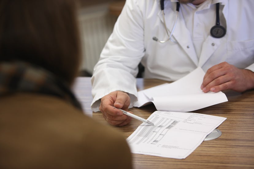 A doctor explaining the test results to his patient with a depression 