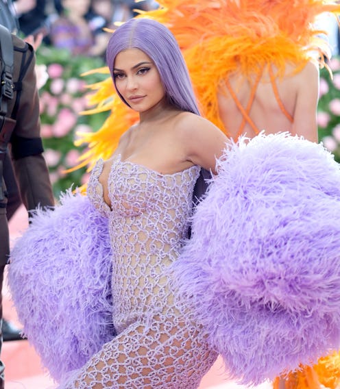 Kyle Jenner wearing a purple feathery Versace outfit on the 2019 Met Gala Red Carpet