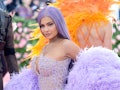 Kyle Jenner wearing a purple feathery Versace outfit on the 2019 Met Gala Red Carpet